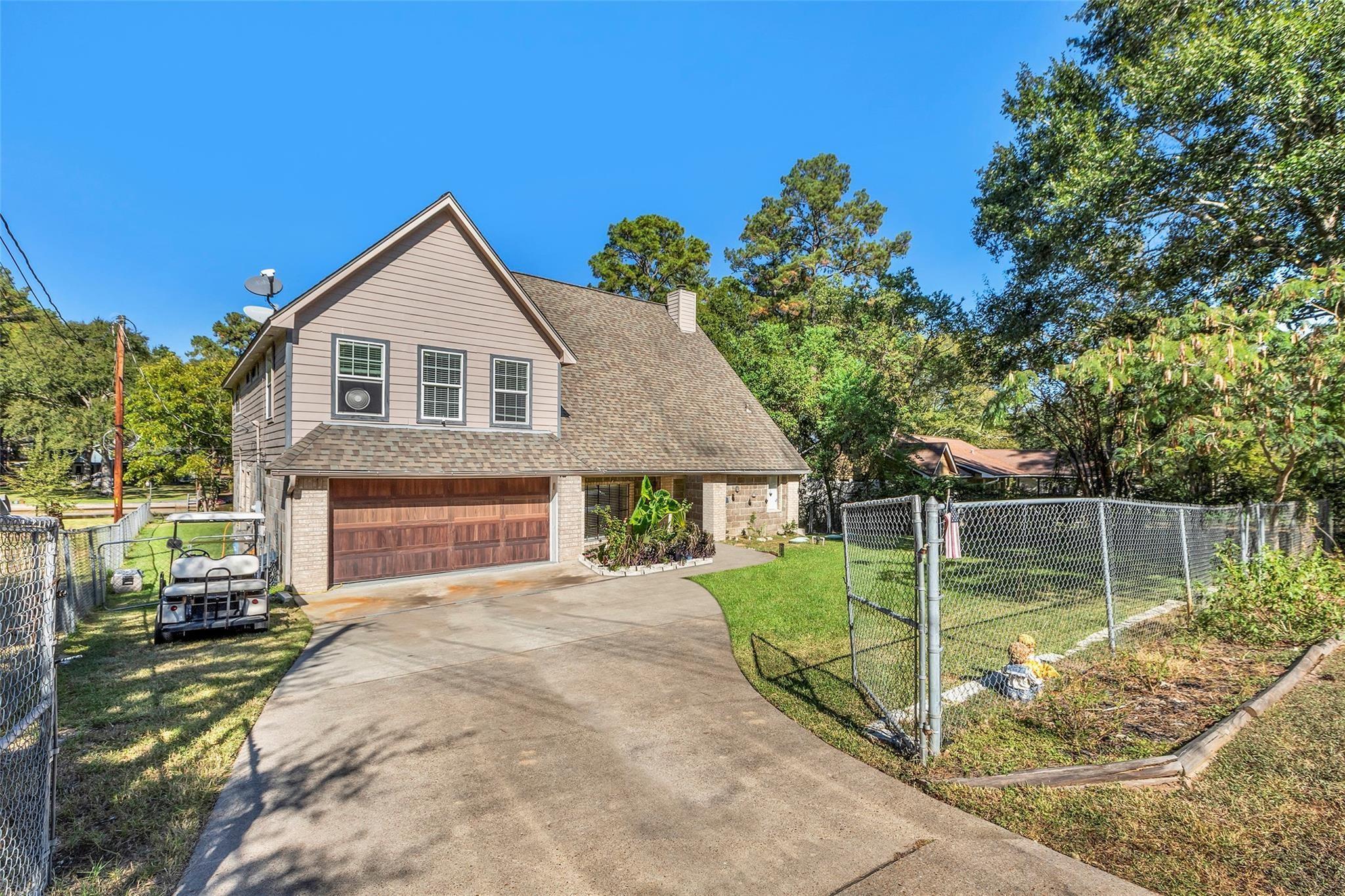 Property Photo: 13392 Southshore Drive TX 77304