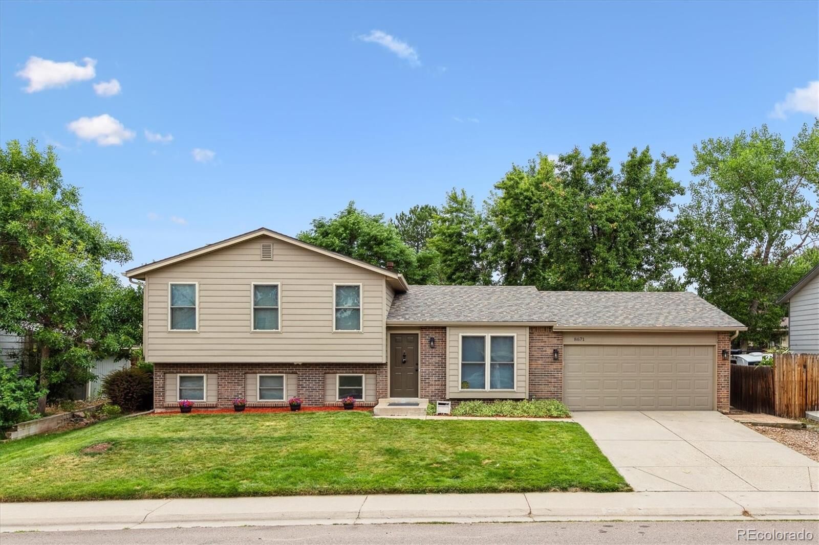 Property Photo:  8671 W Star Circle  CO 80128 