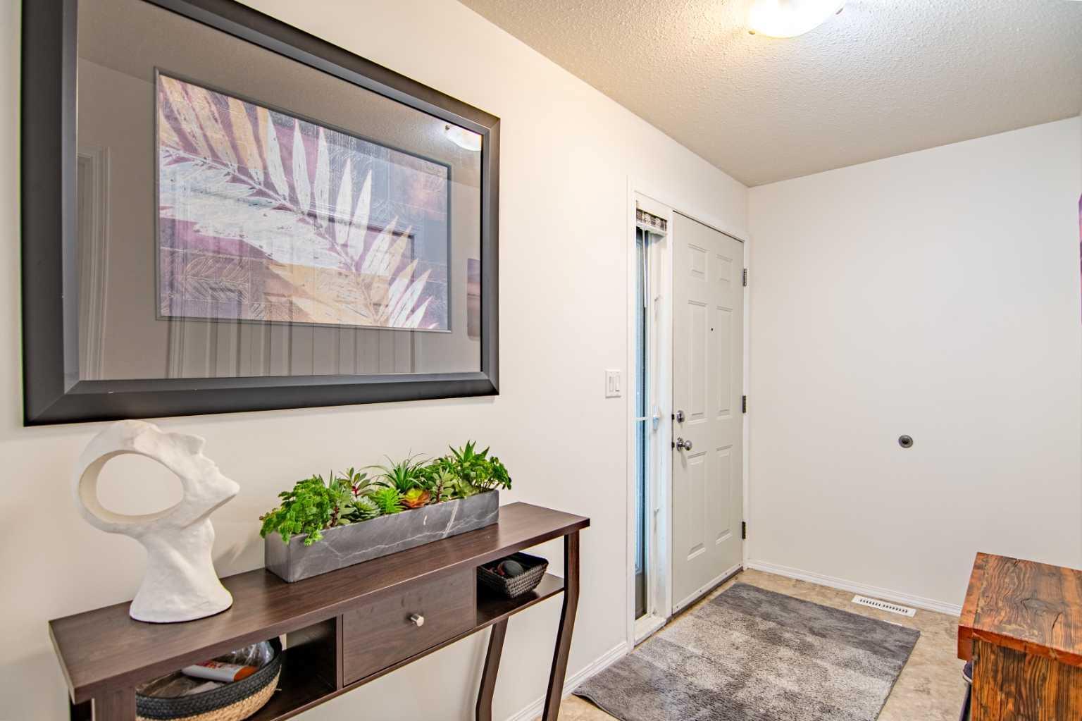 Property Photo: 5220 50A Avenue 2106 AB T4S 1E5