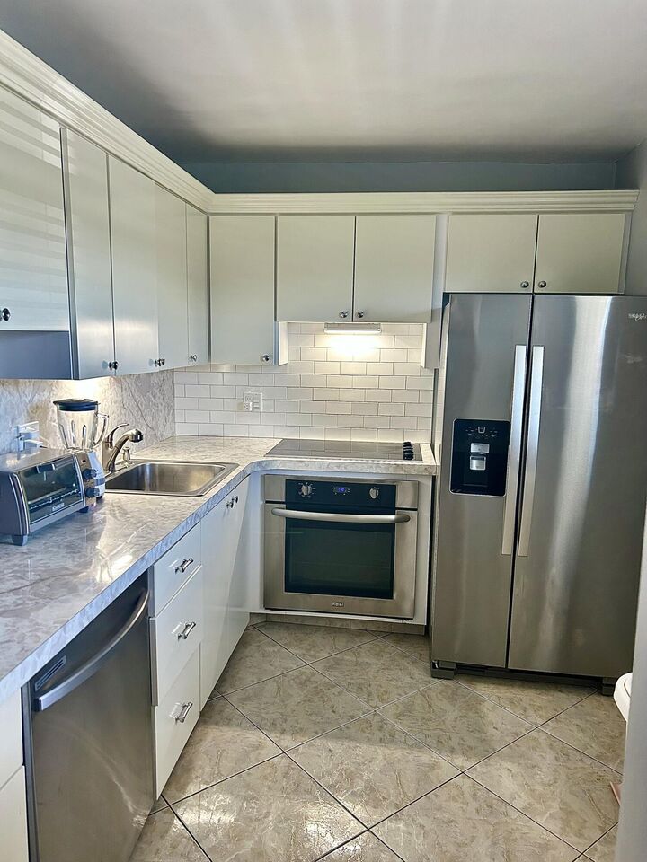 Property Photo:  2600 NE 1st Lane 2050  FL 33435 