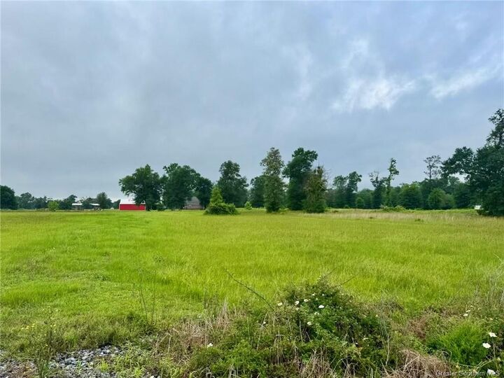 Property Photo:  6405 River Road  LA 70615 