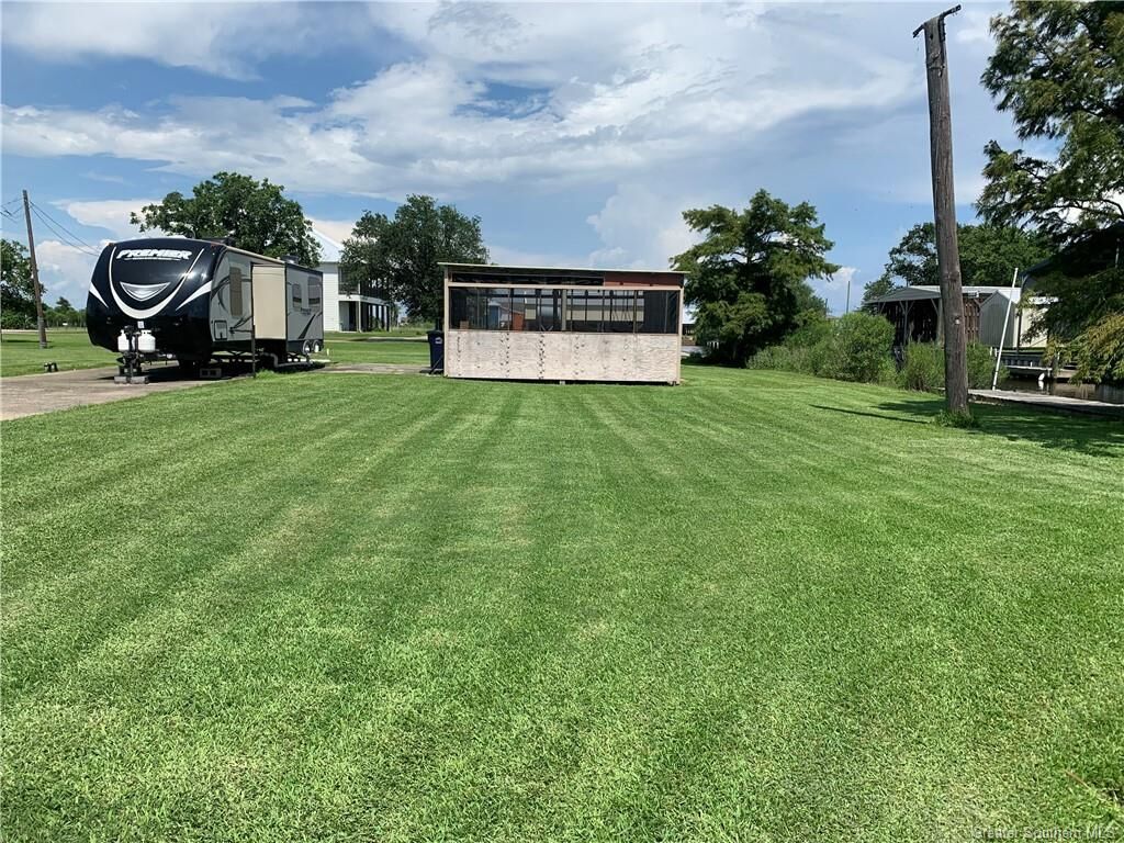 Property Photo: 126 Gulfway Drive LA 70643