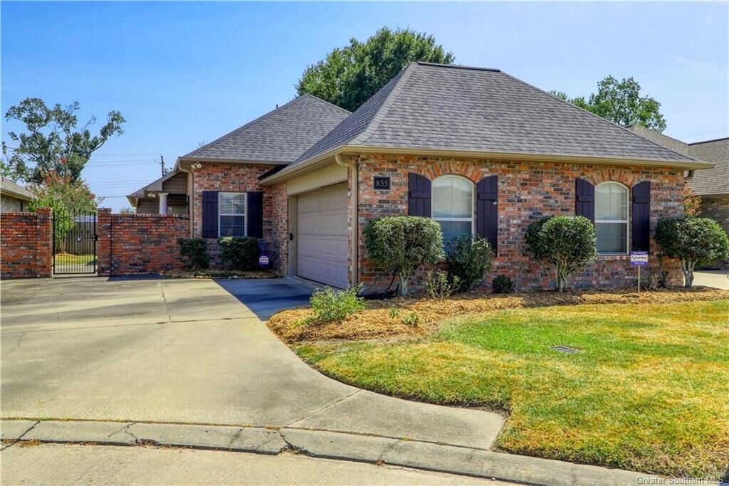 Property Photo:  855 W Contour Drive W  LA 70605 