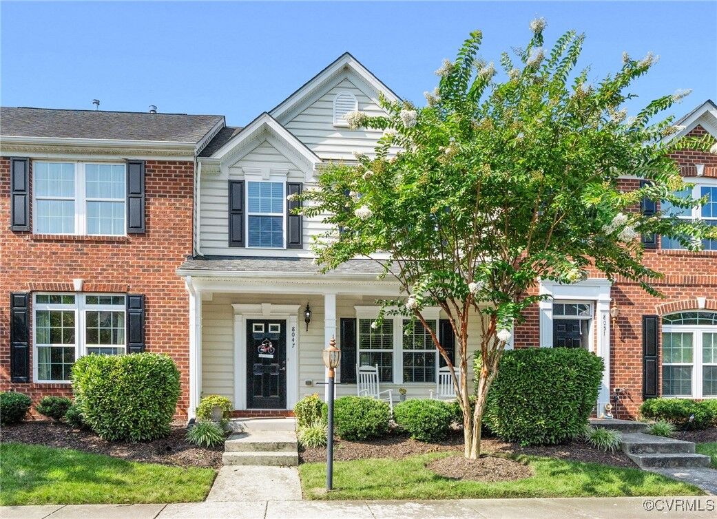 Property Photo: 8047 Creekside Village Drive VA 23111