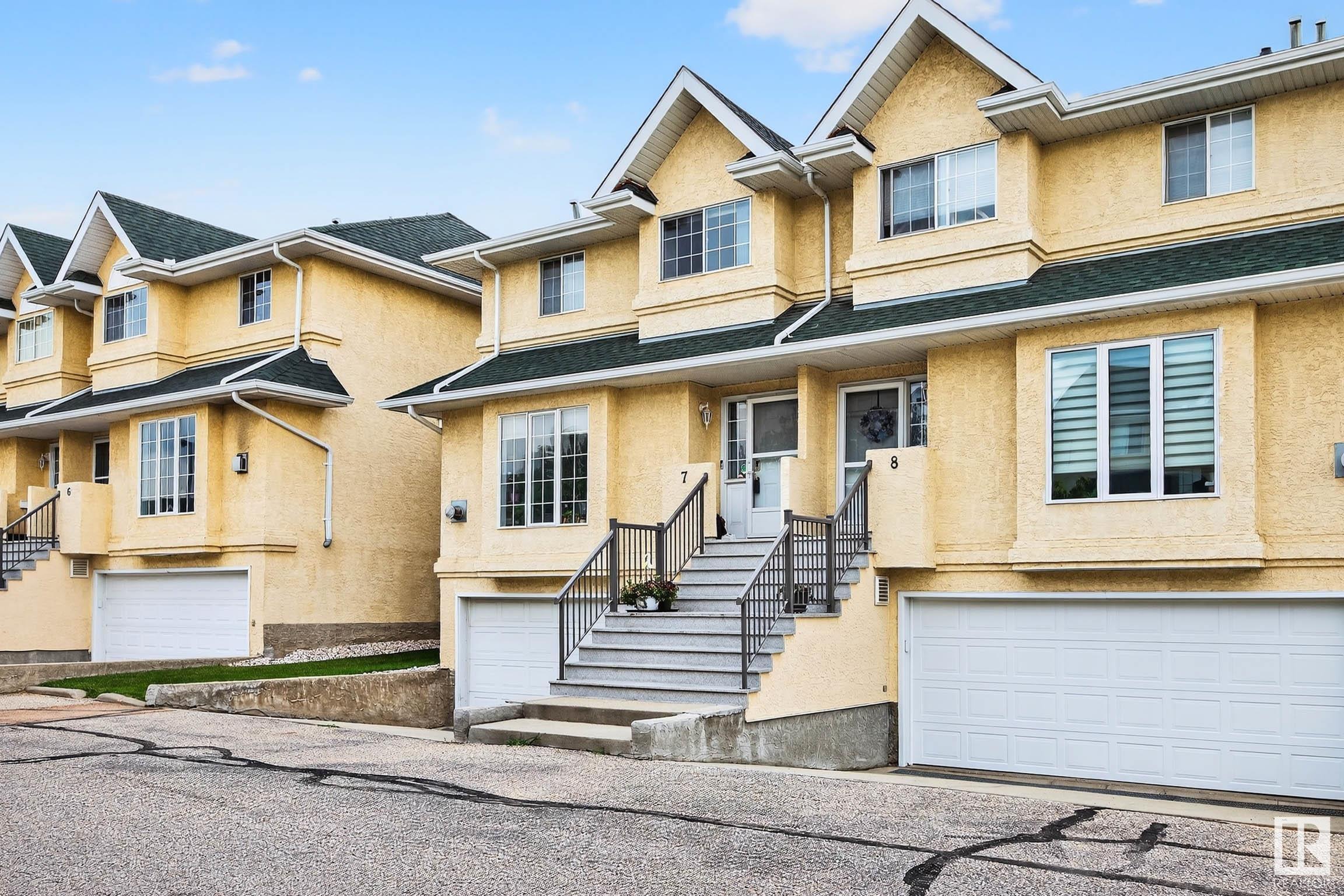 Property Photo: 2419 133 Avenue NW 7 AB T5A 5A5