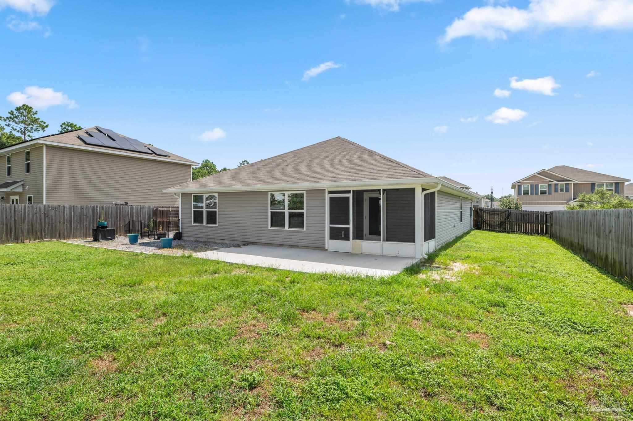 Property Photo: 5887 Southern Bell Ct FL 32570