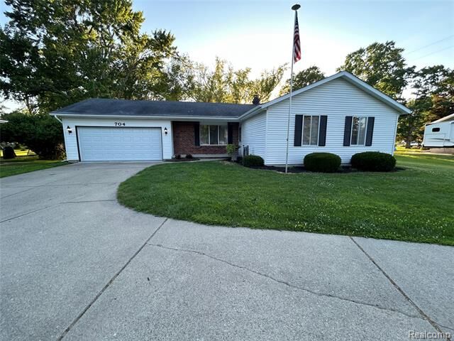 Property Photo:  704 Colorado Street  MI 48040 
