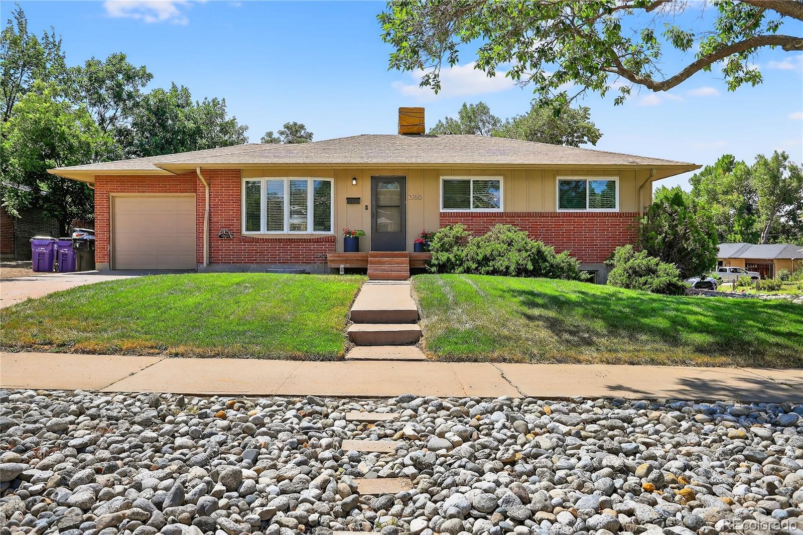 Property Photo: 3760 W Dartmouth Avenue CO 80236