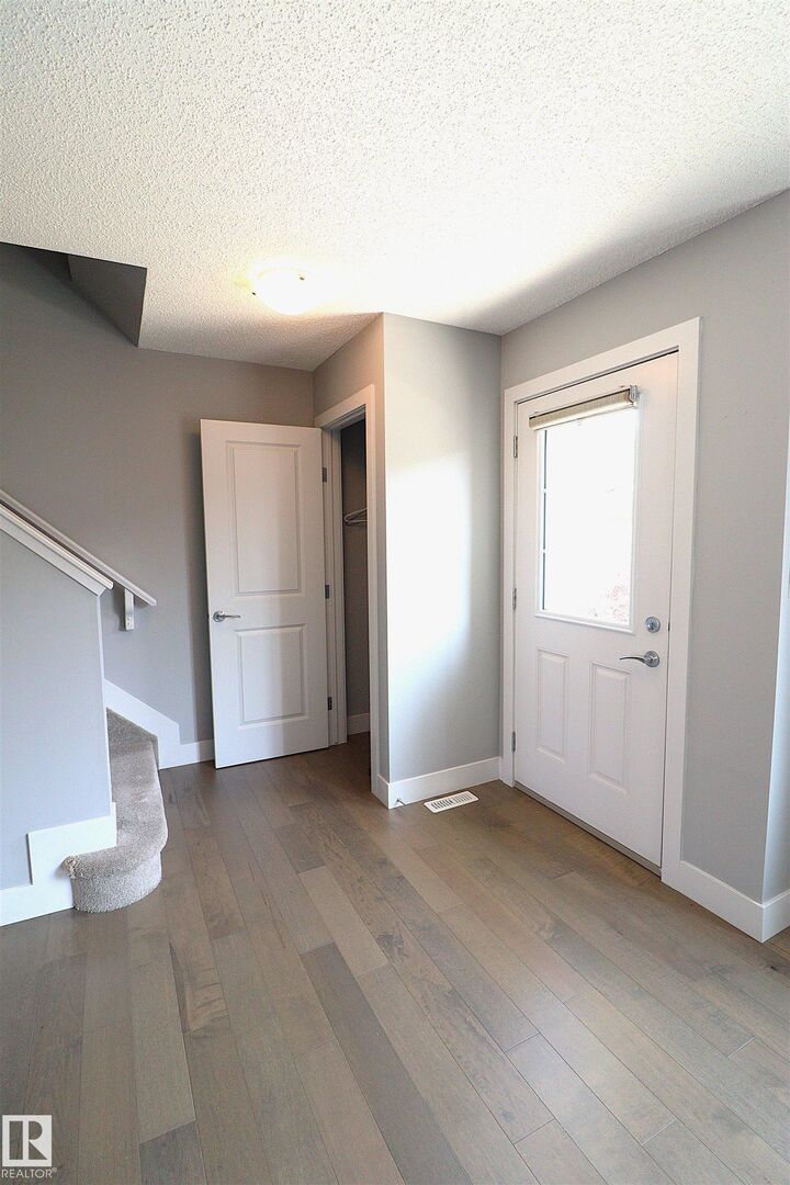 Property Photo: 2922 Maple Way NW 23 AB T6T 1A5