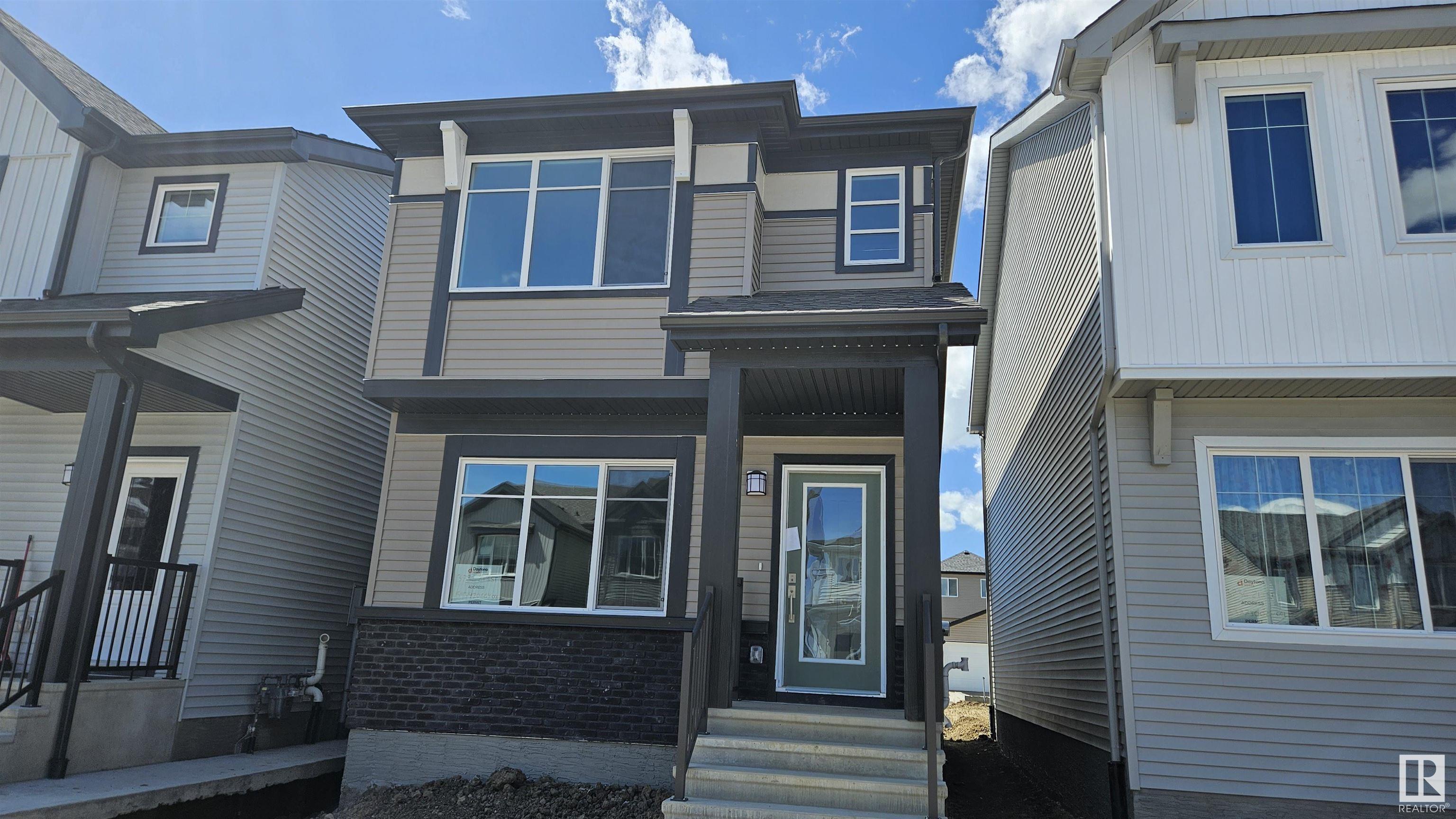 Property Photo:  3732 213 Street NW  AB T6M 3C2 