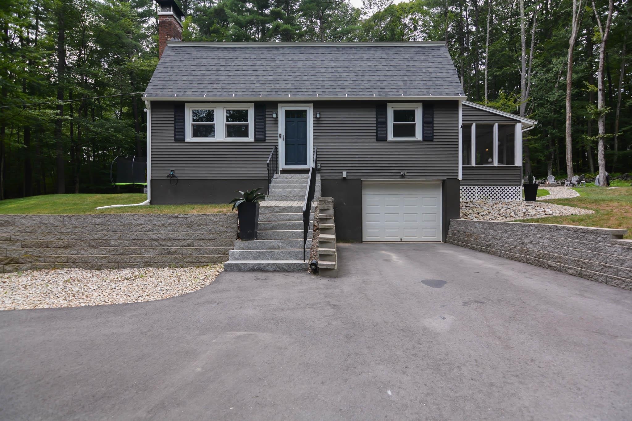 Property Photo: 12 Deerwood Drive NH 03031