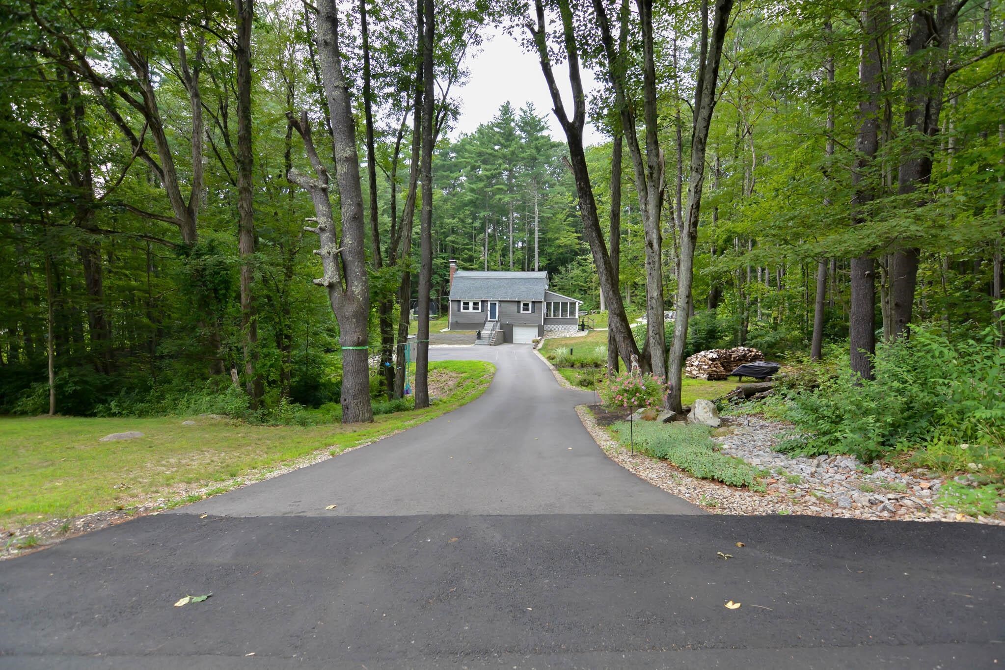 Property Photo: 12 Deerwood Drive NH 03031