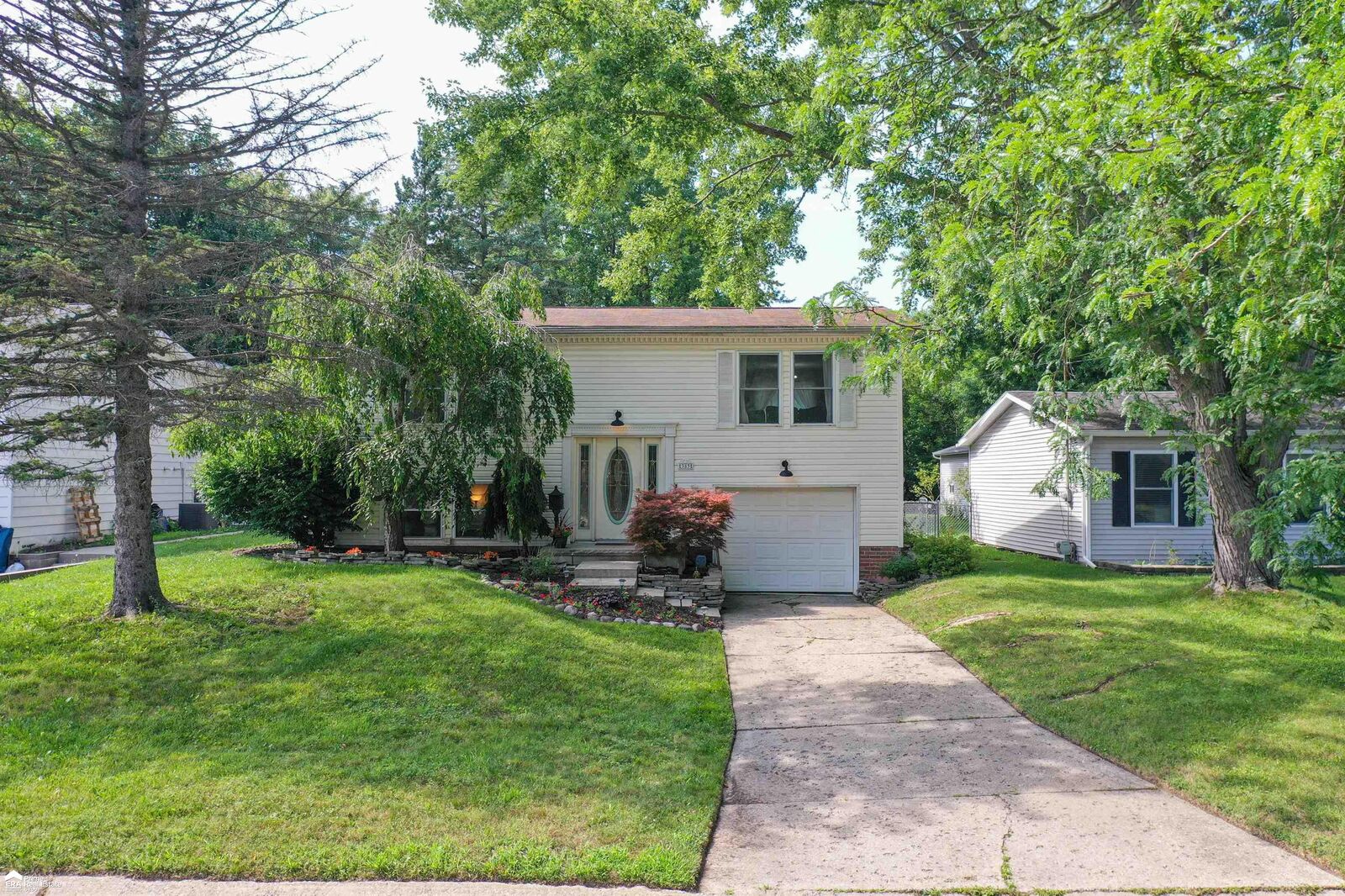Property Photo:  383 Bush Avenue  MI 48439 