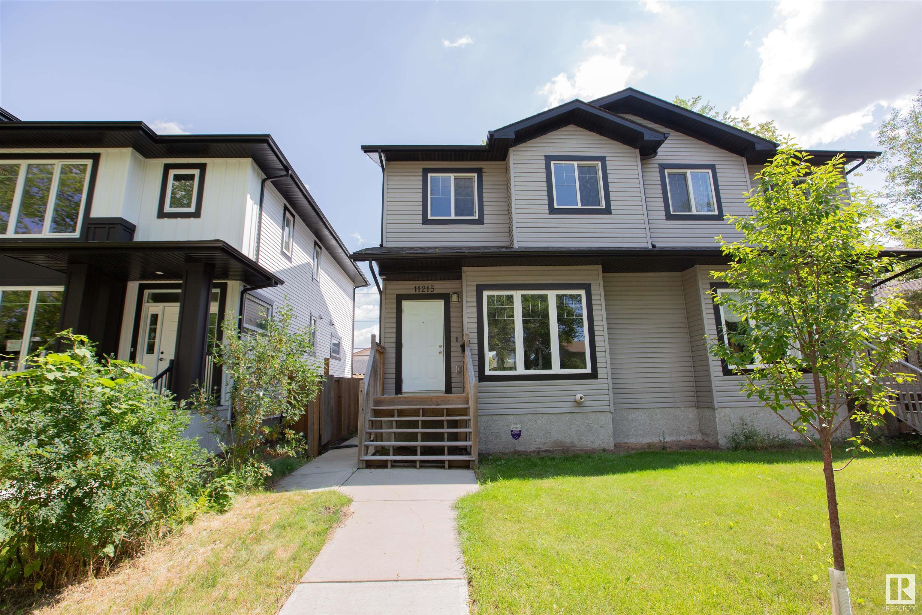 Property Photo:  11215 125 Street NW  AB T5M 0M6 