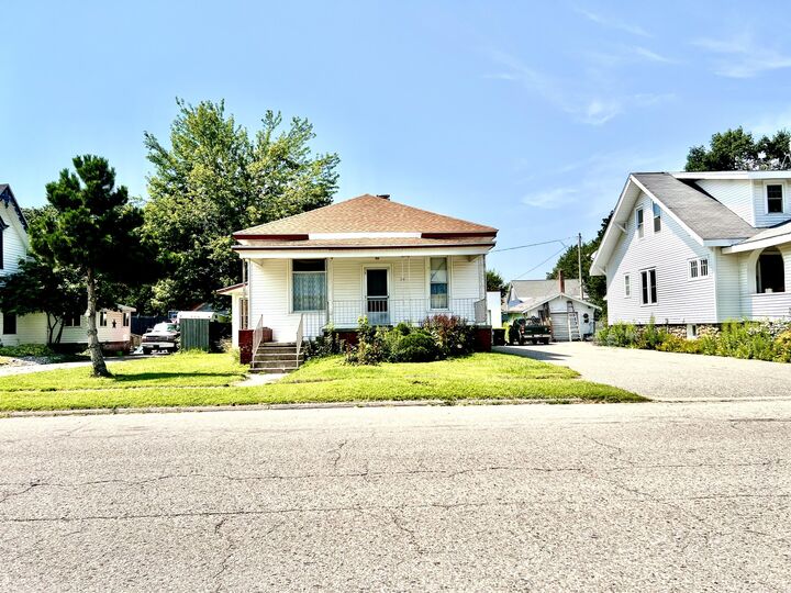 Property Photo: 114 S Huron Street MI 49721