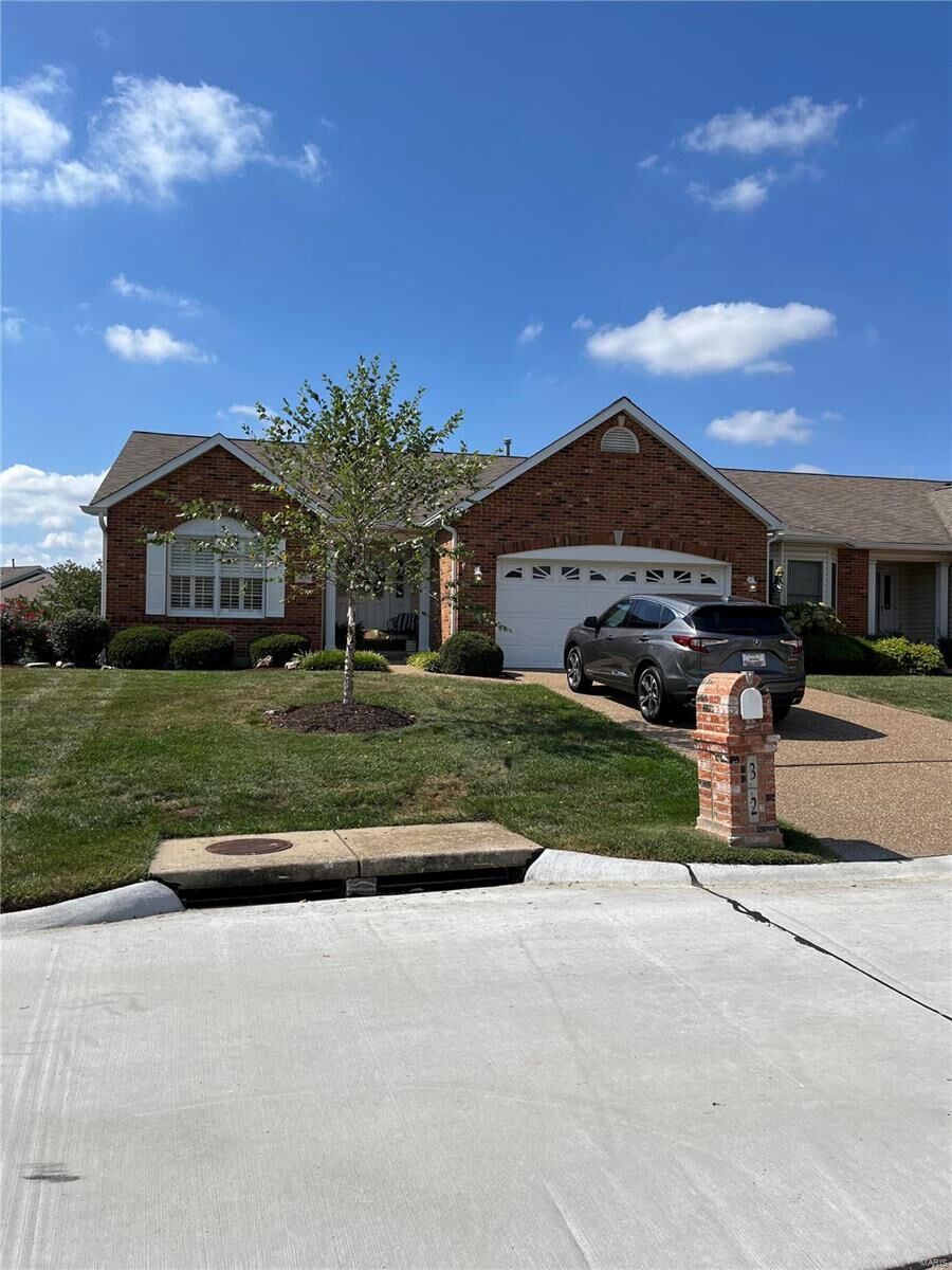 Property Photo:  32 Tournament Tee Drive 708A  MO 63368 
