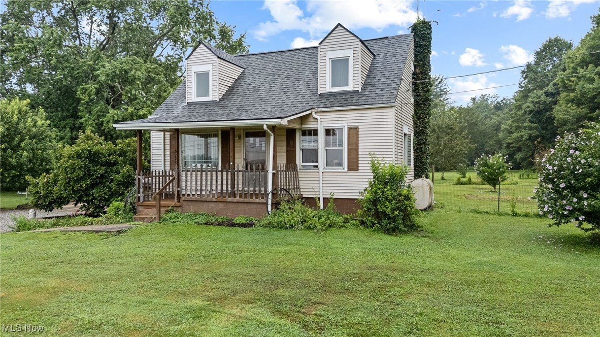 Property Photo:  10228 Beloit Snodes Road  OH 44609 
