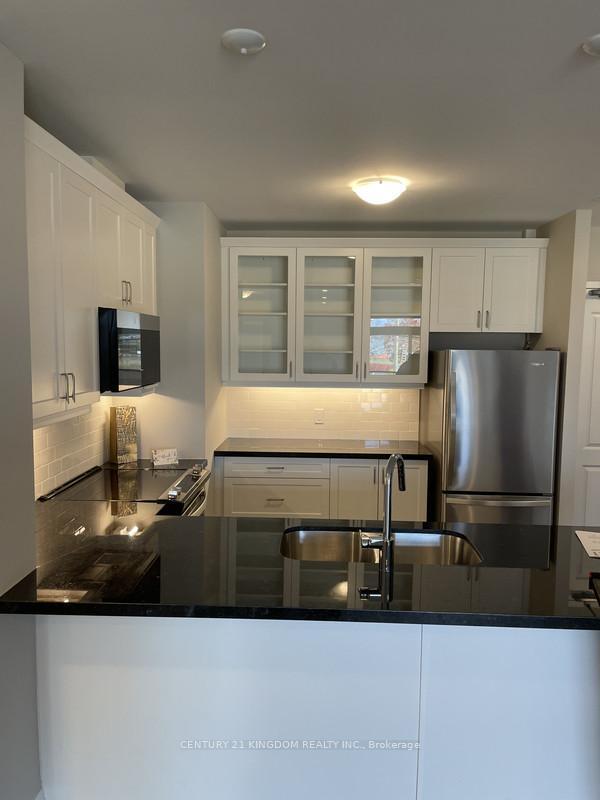 Property Photo: 830 Megson Terrace 205 ON L9T 7H3