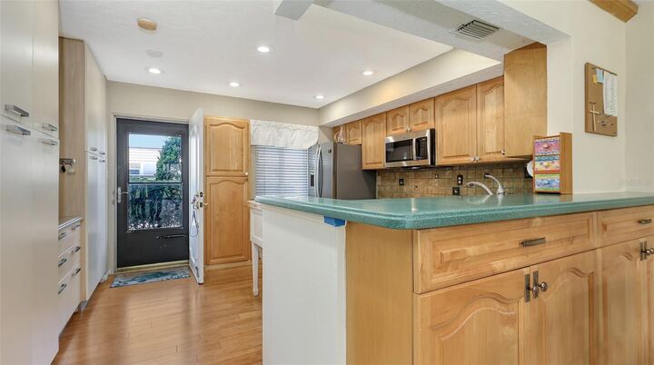 Property Photo:  8897 Midnight Pass Road 105  FL 34242 