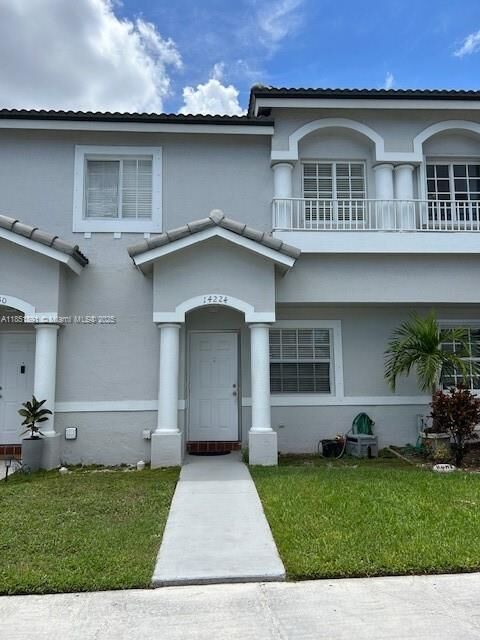 Property Photo: 14224 SW 121st Pl 4 FL 33186