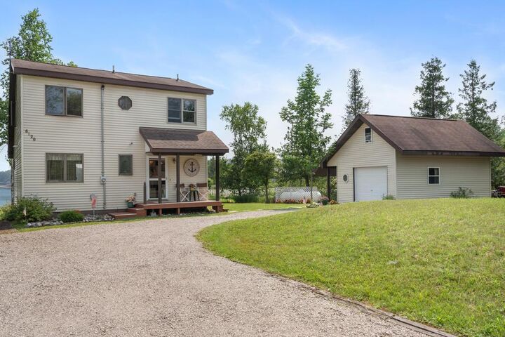 Property Photo:  6120 Truscott Drive  MI 49721 