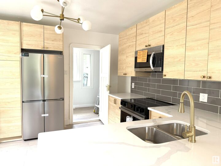 Property Photo: 11840 70 Street NW AB T5B 1T7