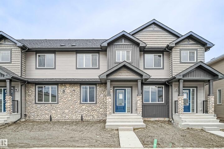 Property Photo:  204 Savoy Crescent  AB T8H 1Z8 