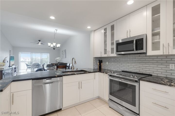 Property Photo:  7766 Emerald Circle R203  FL 34109 