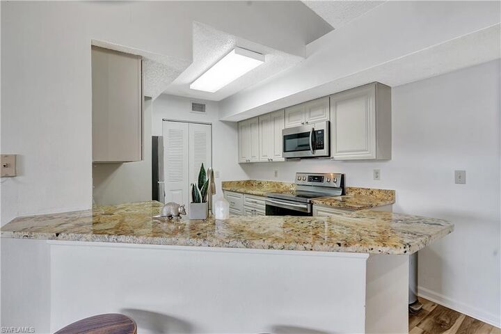 Property Photo:  13615 Eagle Ridge Dr 1633  FL 33912