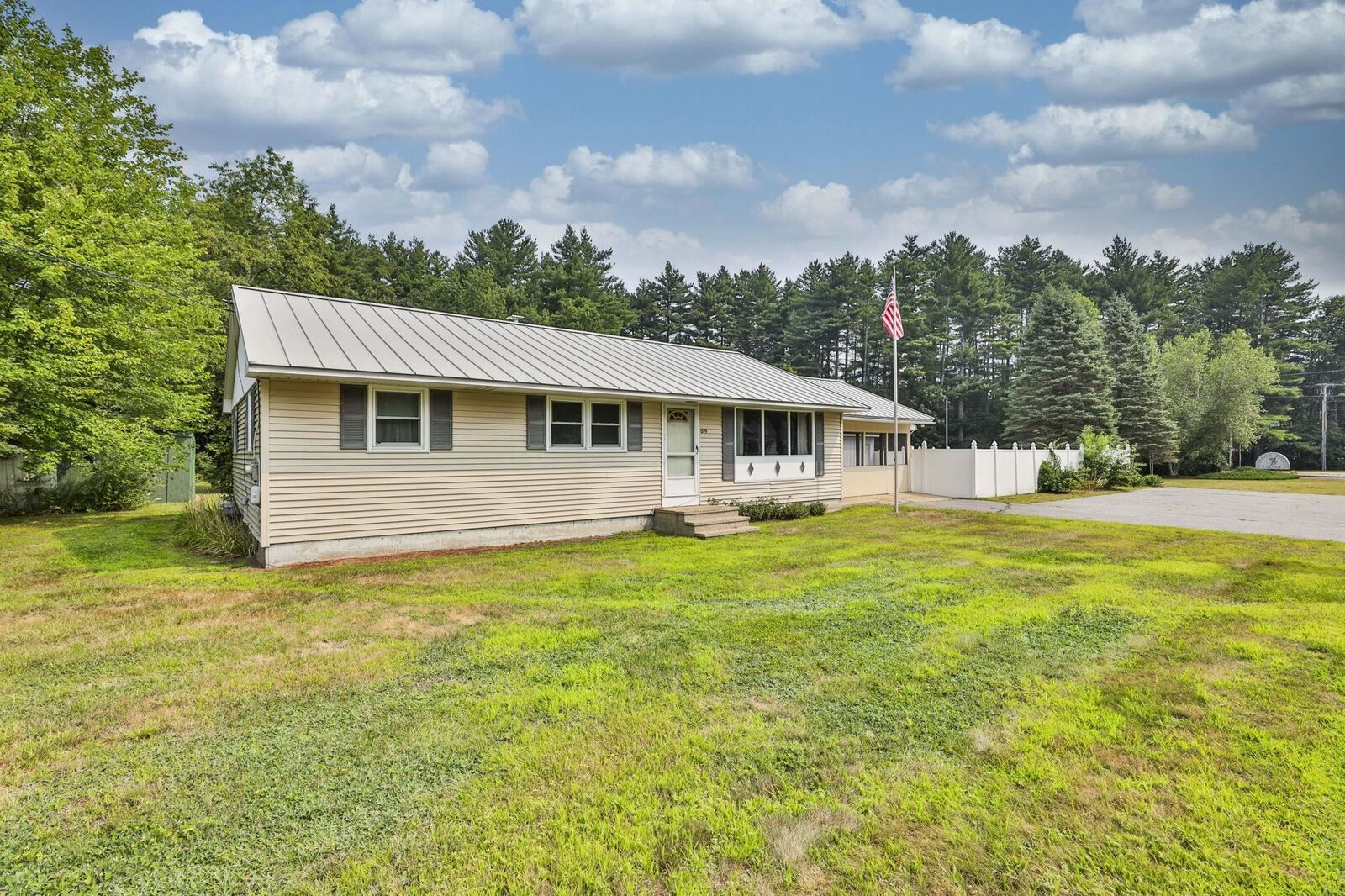 Property Photo:  69 Baboosic Lake Road  NH 03054 