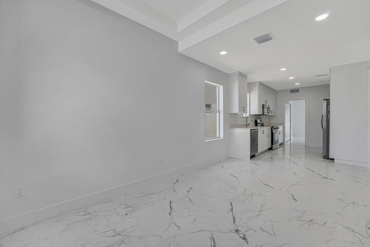 Property Photo: 409 NW 12th Avenue FL 33435