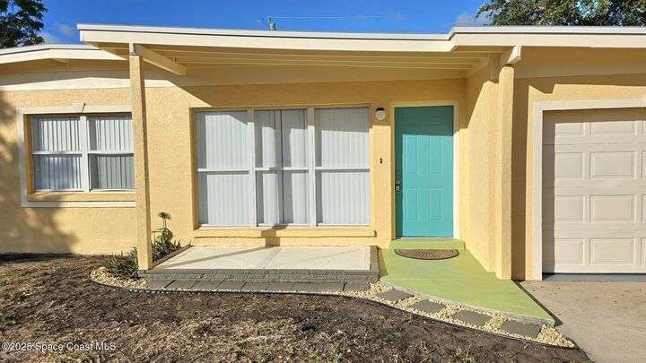 Property Photo:  402 Edinburgh Drive  FL 32922 