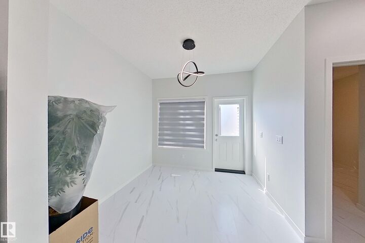 Property Photo:  7118 46A Street  AB T6T 2J1 