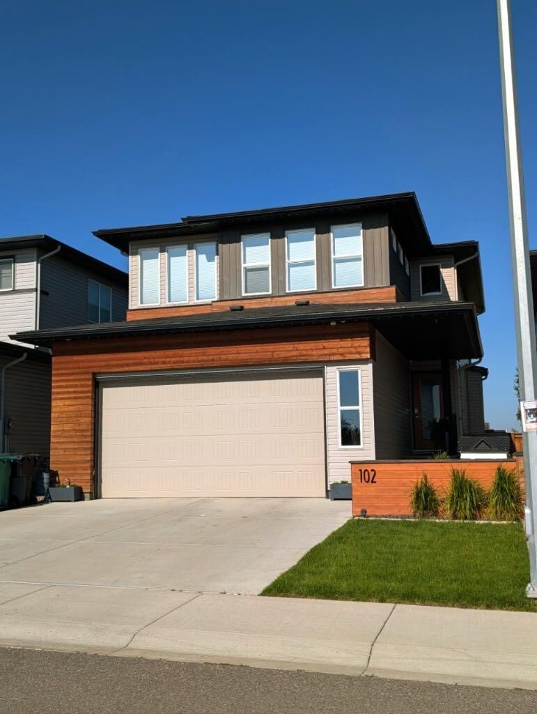 Property Photo: 102 Blackwolf Bay N AB T1H 7E9