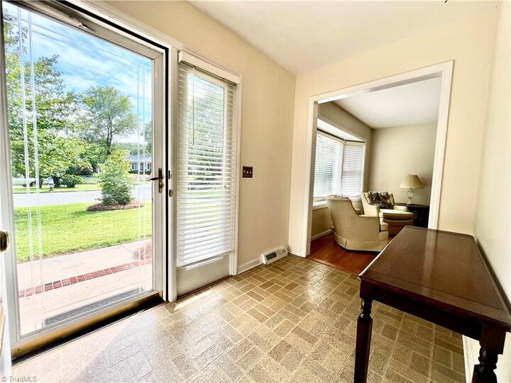 Property Photo:  2408 Gracewood Court  NC 27408 