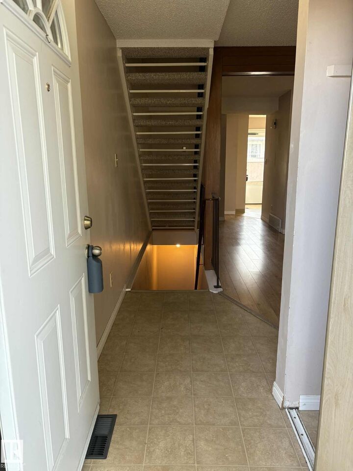 Property Photo:  10405 24 Avenue NW  AB T6J 4S2 