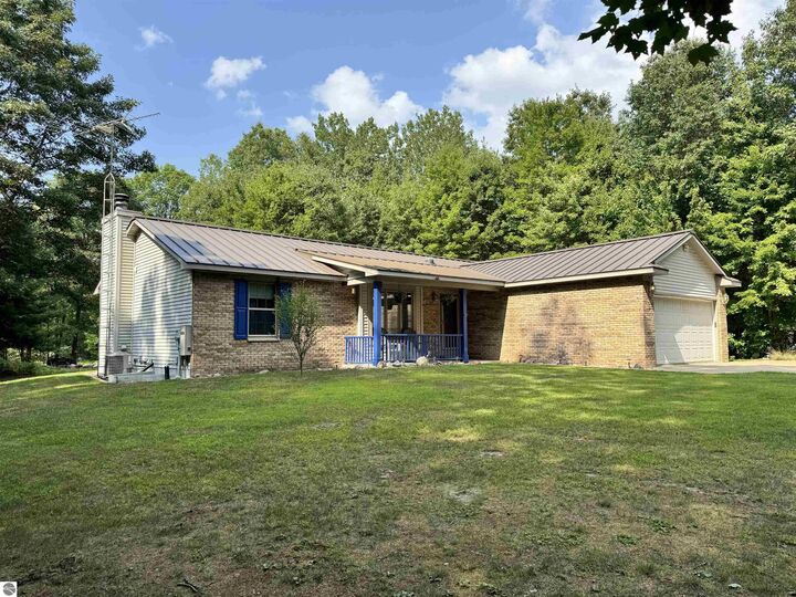 Property Photo:  11167 E Arnold Lake Road  MI 48624 