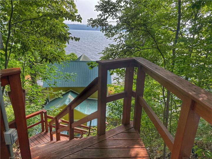 Property Photo:  8119 Bainbridge Beach Road  NY 14847 