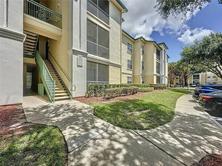 Property Photo:  8919 Legacy Ct 104  FL 34747 