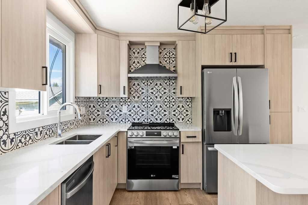 Property Photo:  856 Rundlecairn Way NE  AB T1Y 2R7 