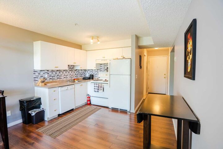 Property Photo:  1620 70 Street SE 4112  AB T2A 7Z3 