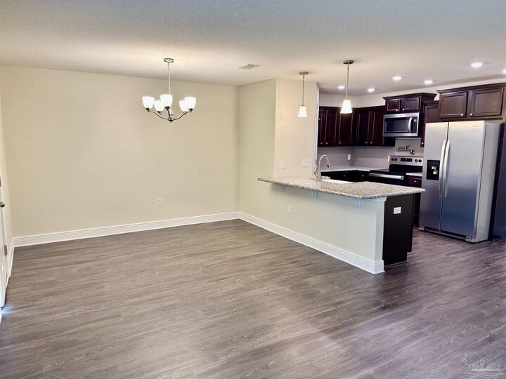 Property Photo:  5065 Peach Dr  FL 32571 