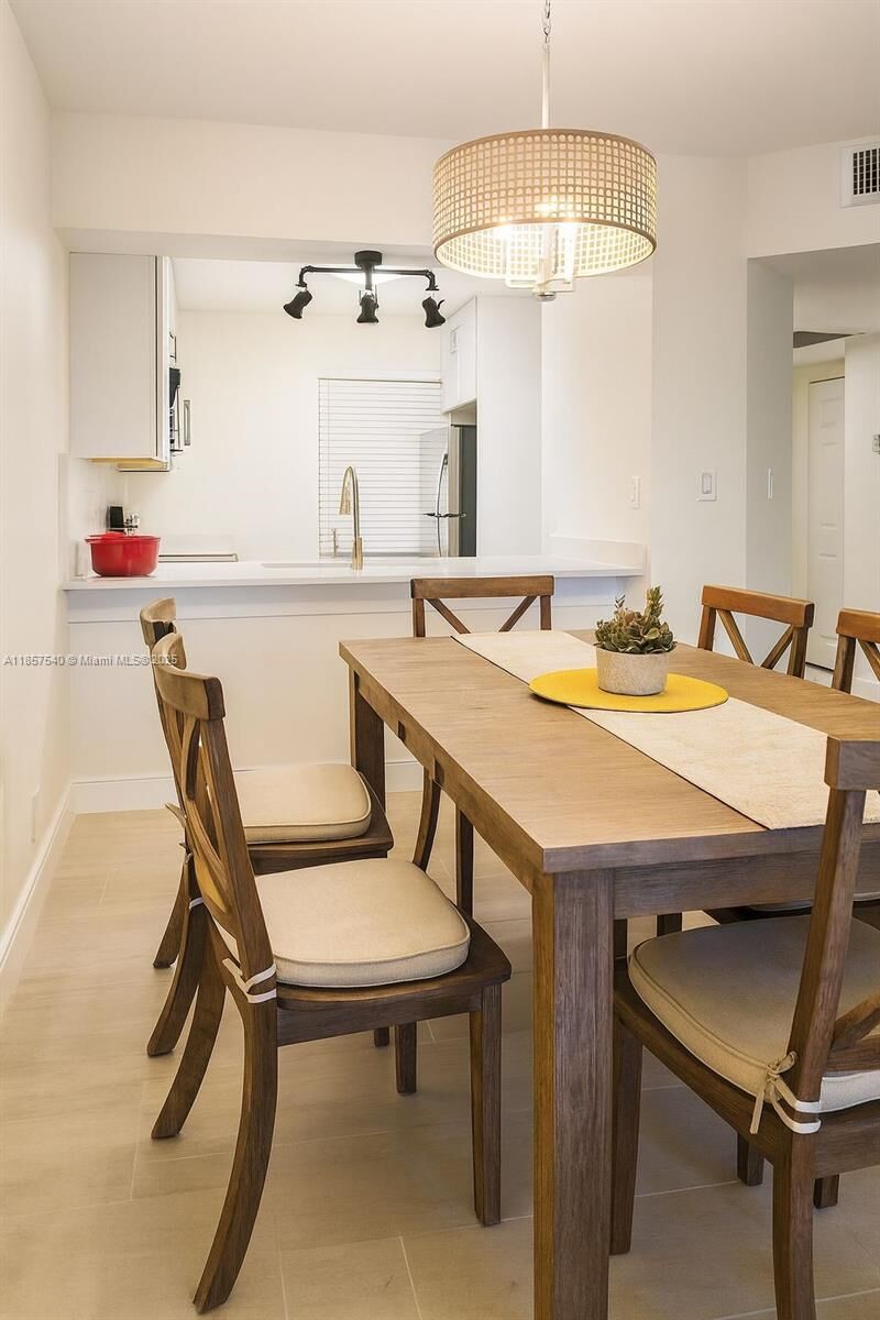 Property Photo:  10501 W Broward Blvd 303  FL 33324 