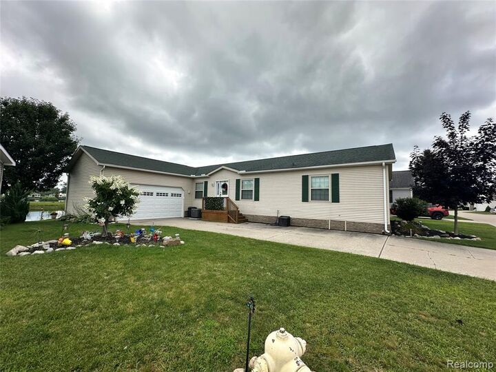 Property Photo:  148 Pine Lakes Drive  MI 48446 4502 
