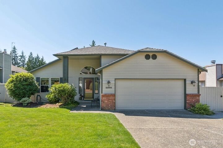 Property Photo:  5002  9th Avenue W  WA 98203 