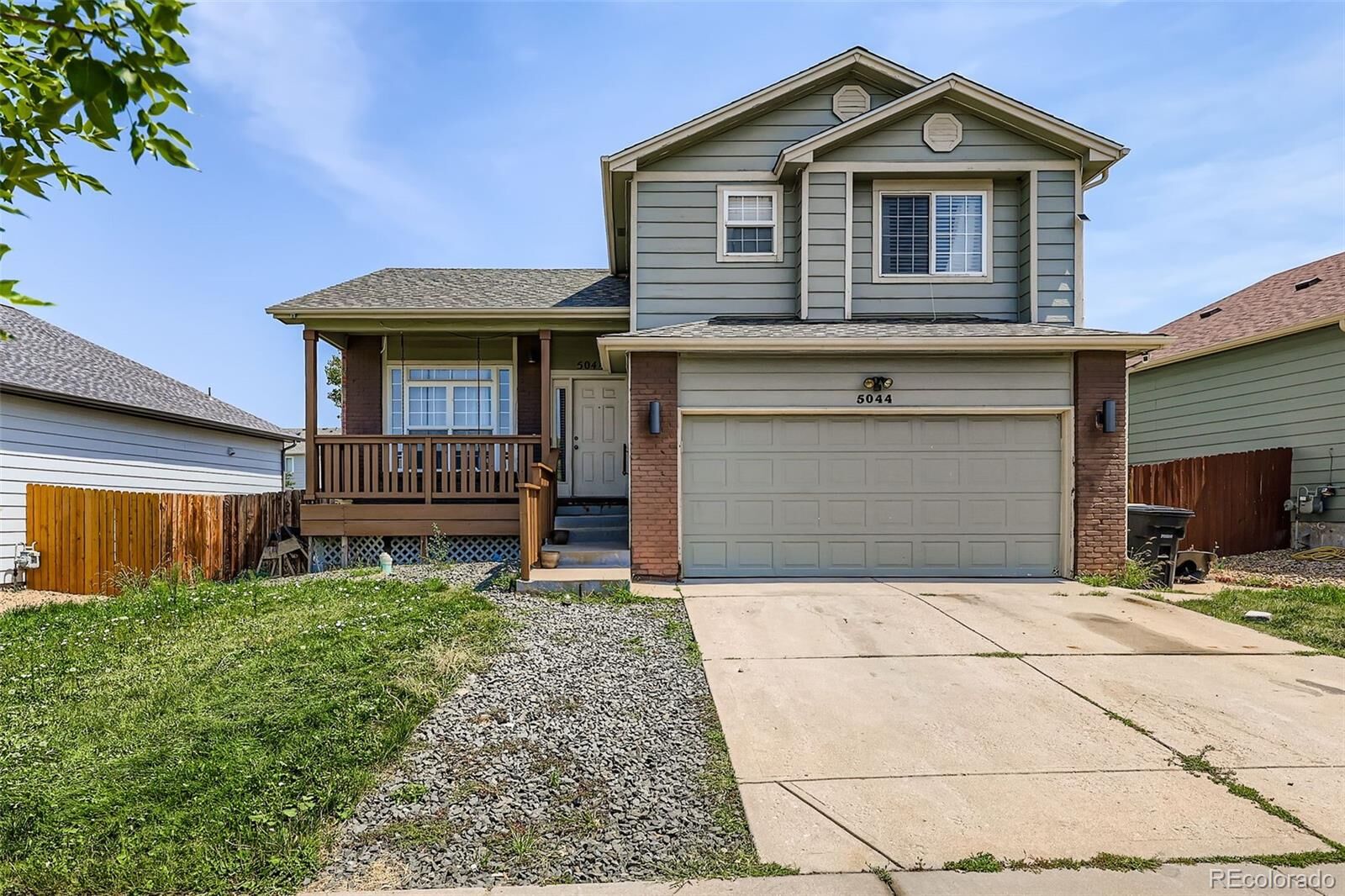 Property Photo:  5044 Sable Street  CO 80239 