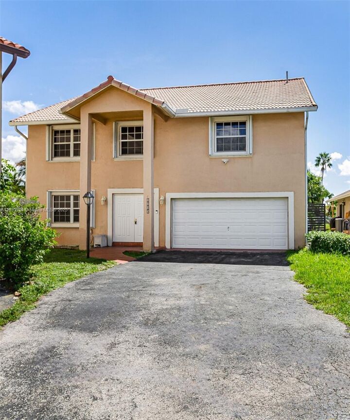 Property Photo:  7725 NW 192nd St  FL 33015 