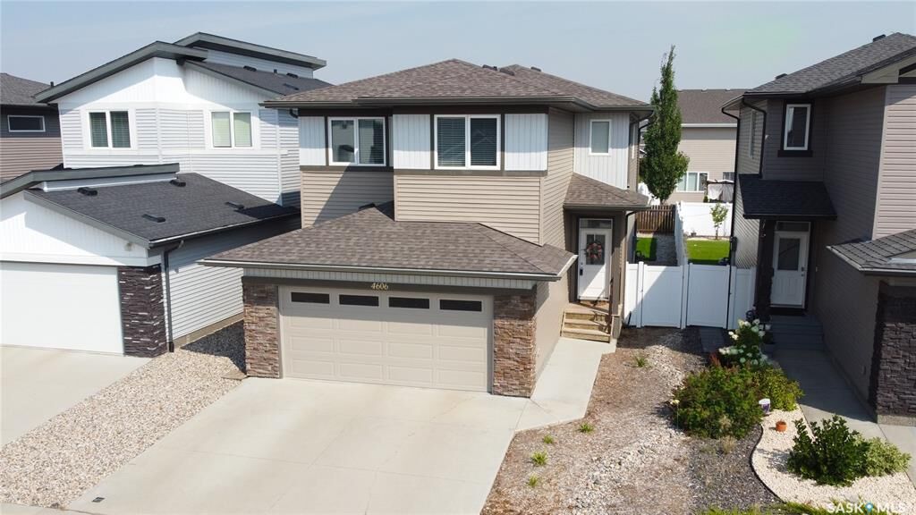 Property Photo:  4606 Green Brooks Way E  SK S4V 3K6 