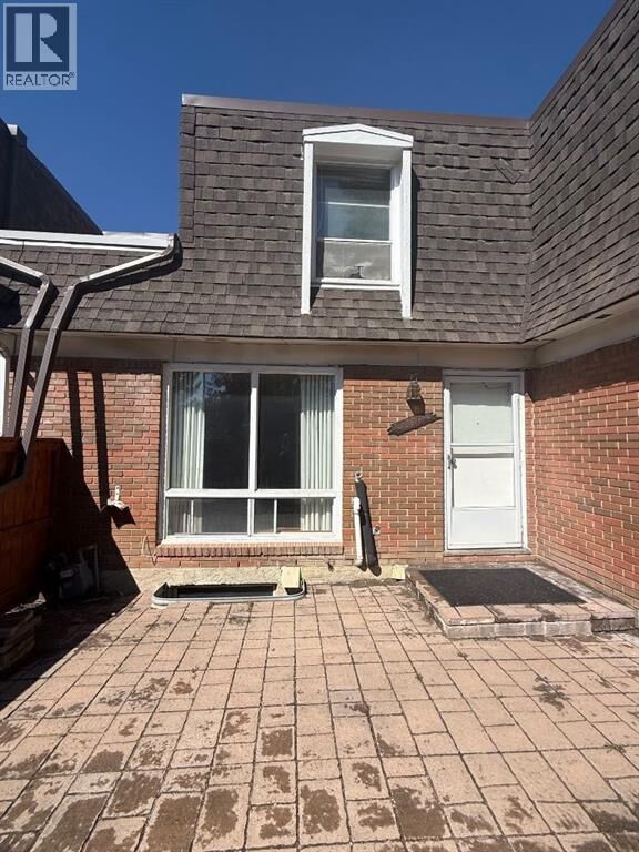 Property Photo: 330 Canterbury Drive Southwest AB T2W 1H6