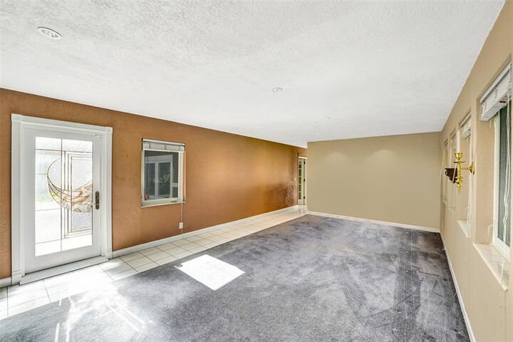 Property Photo:  5562 SW 1st Ct  FL 33317 